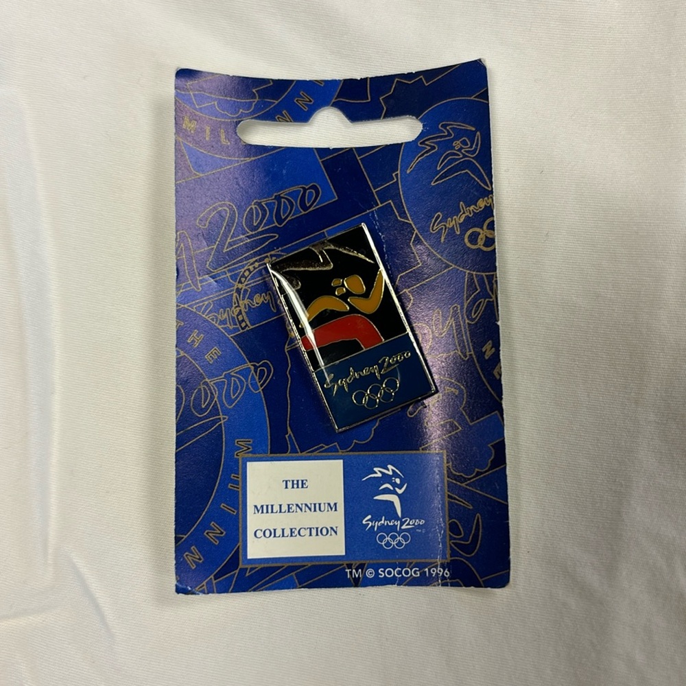 Sydney 2000 official Olympic pin. Never used. On original tag.
